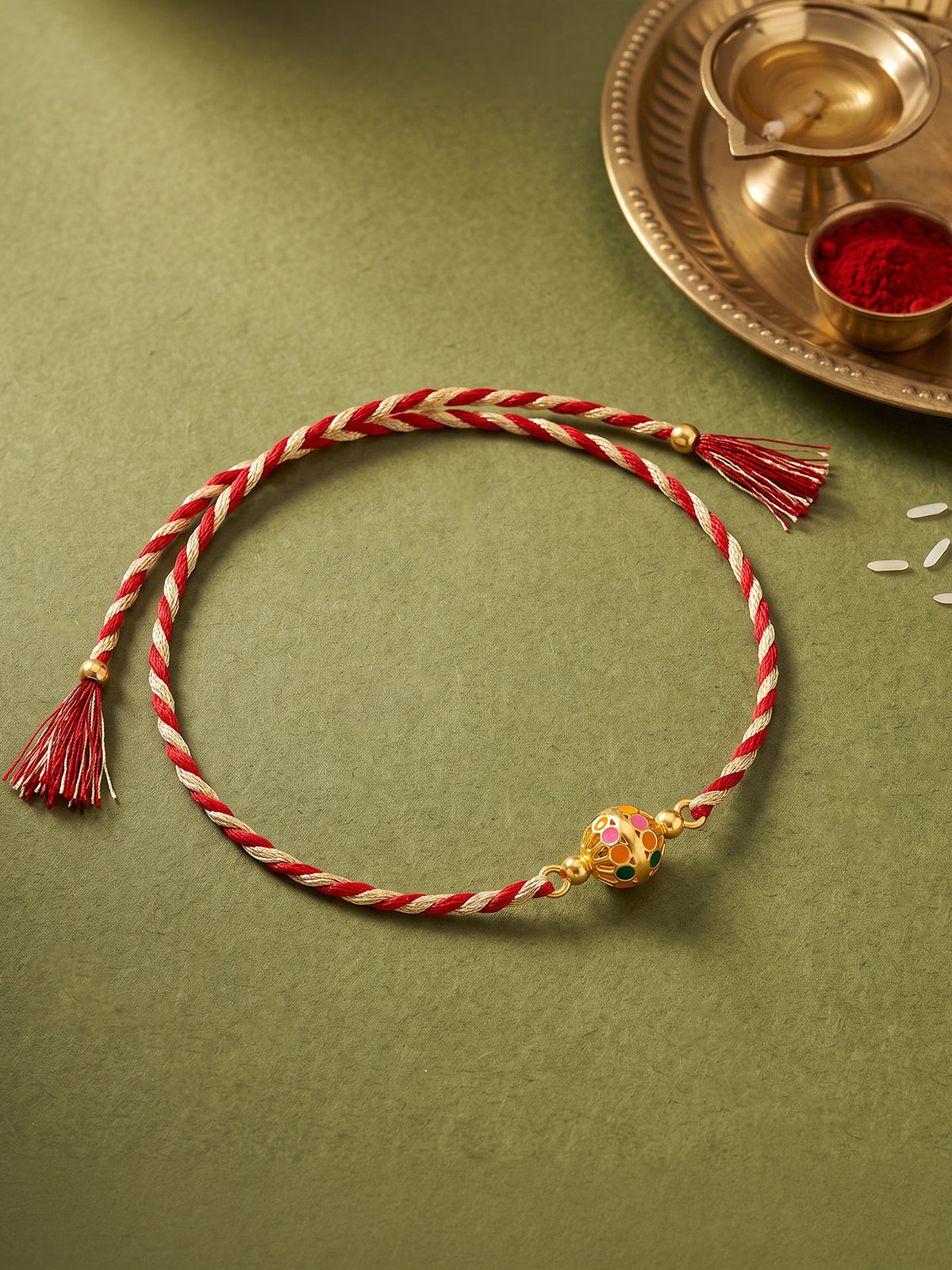 Golden Charming Ball Rakhi