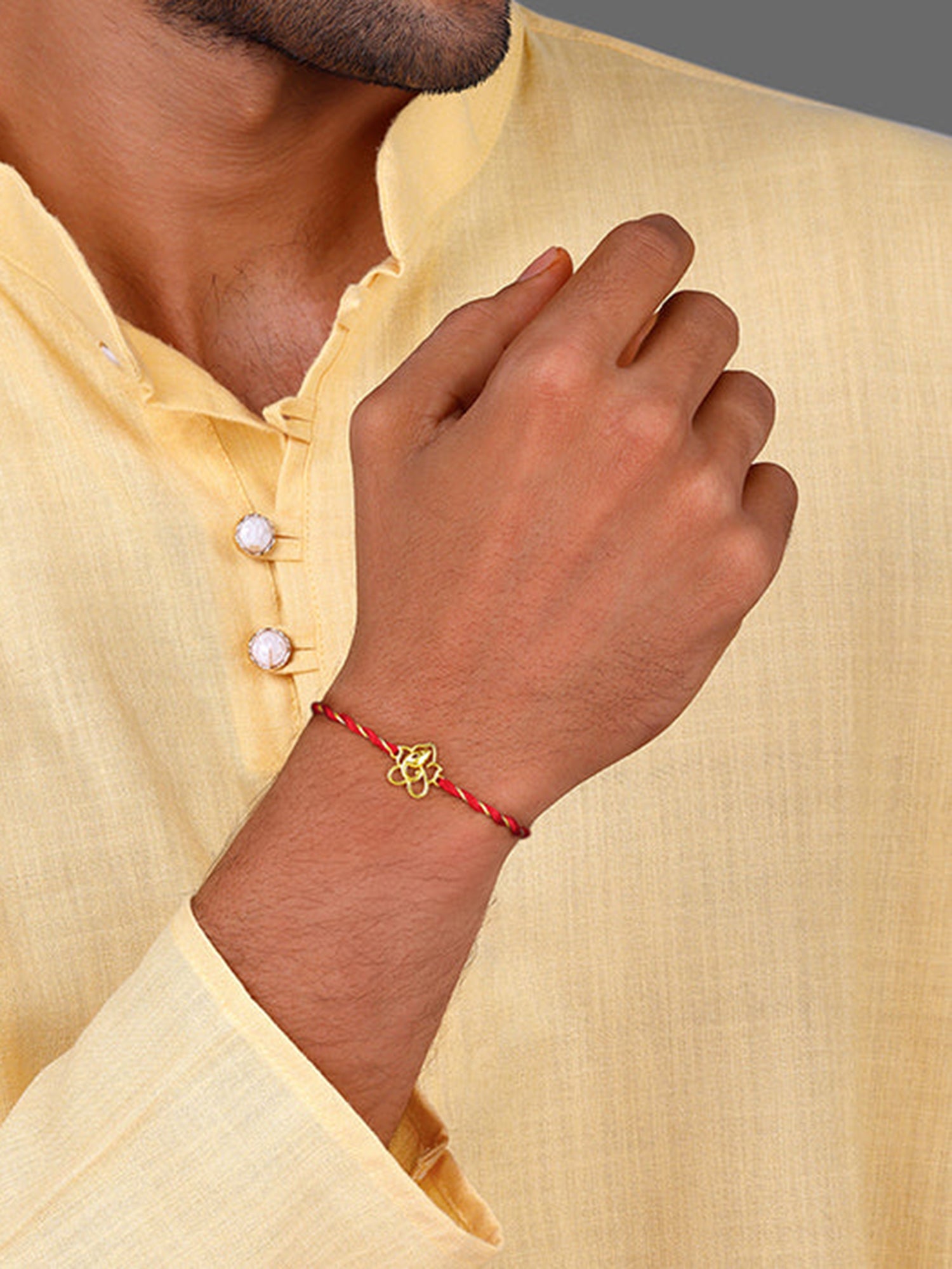 Golden Divine Ganesha Rakhi