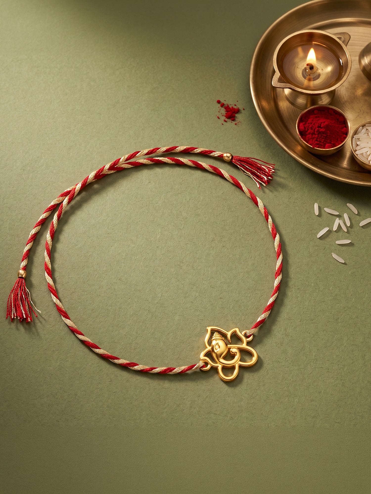 Golden Divine Ganesha Rakhi