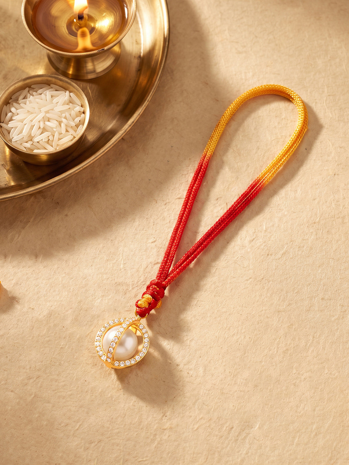 Golden Lumba Pearl Rakhi