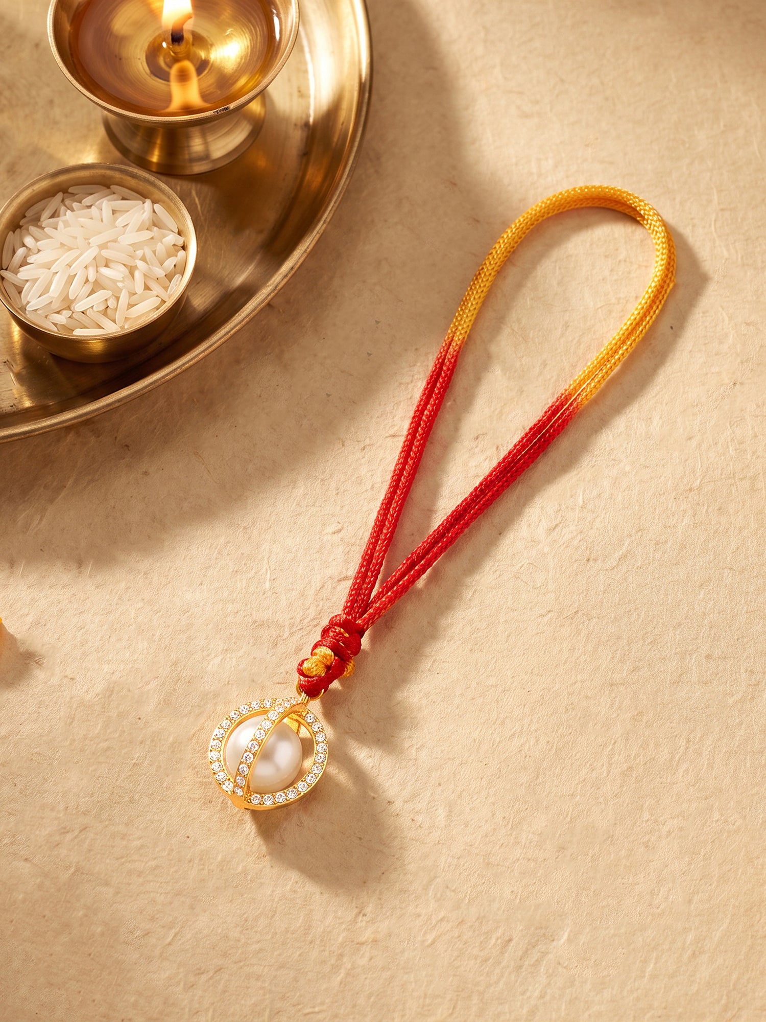 Golden Lumba Pearl Rakhi