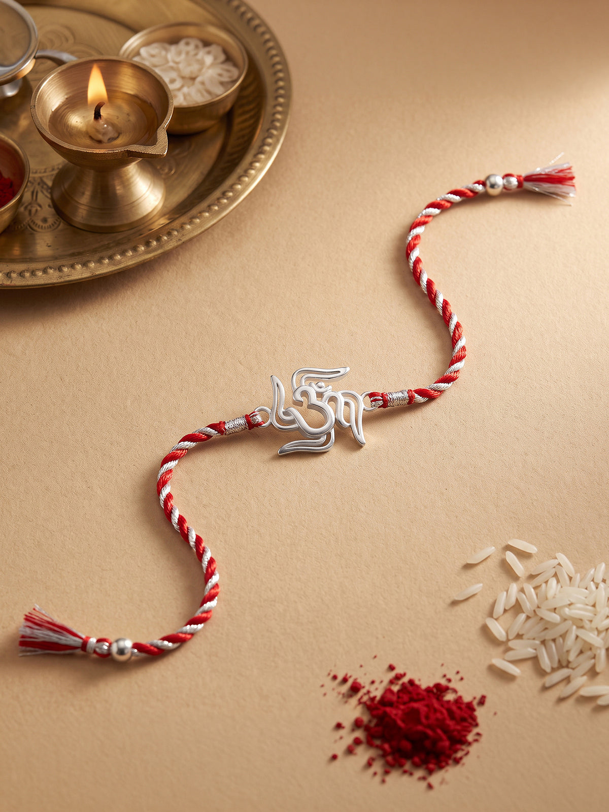 Silver Om and Swastik Rakhi