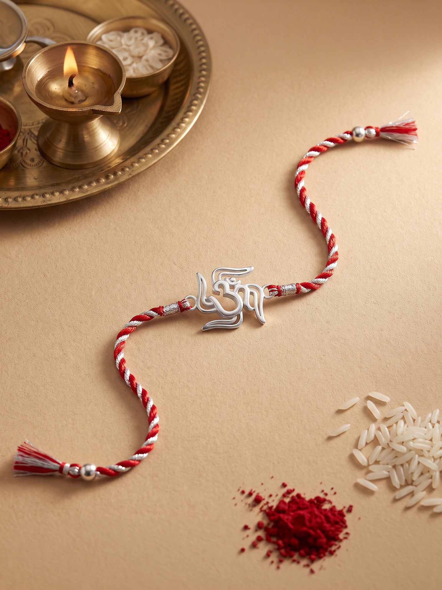 Silver Om and Swastik Rakhi