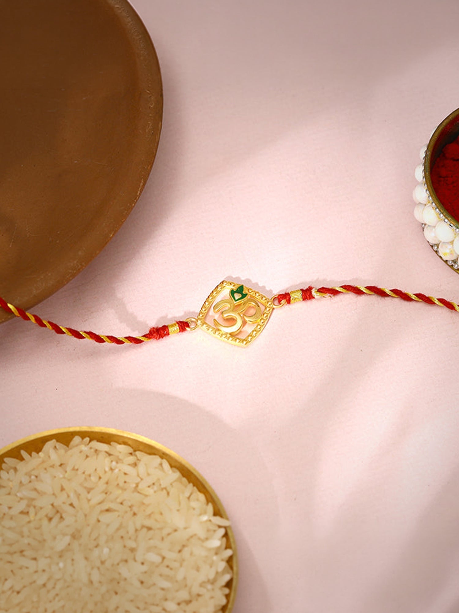 Golden Omkara Rakhi