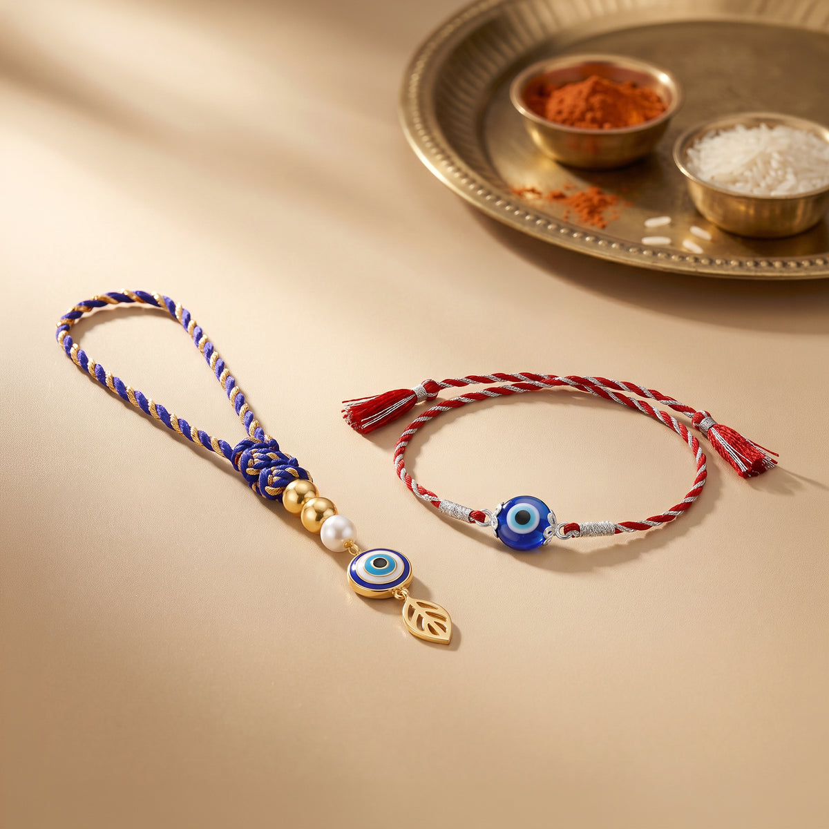 Silver & Golden Evil Eye Bhaiya Bhabhi Rakhi Combo (Set of 2)