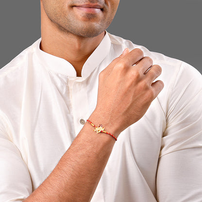 Golden Ganpati Shakti Rakhi Combo (Set of 2)