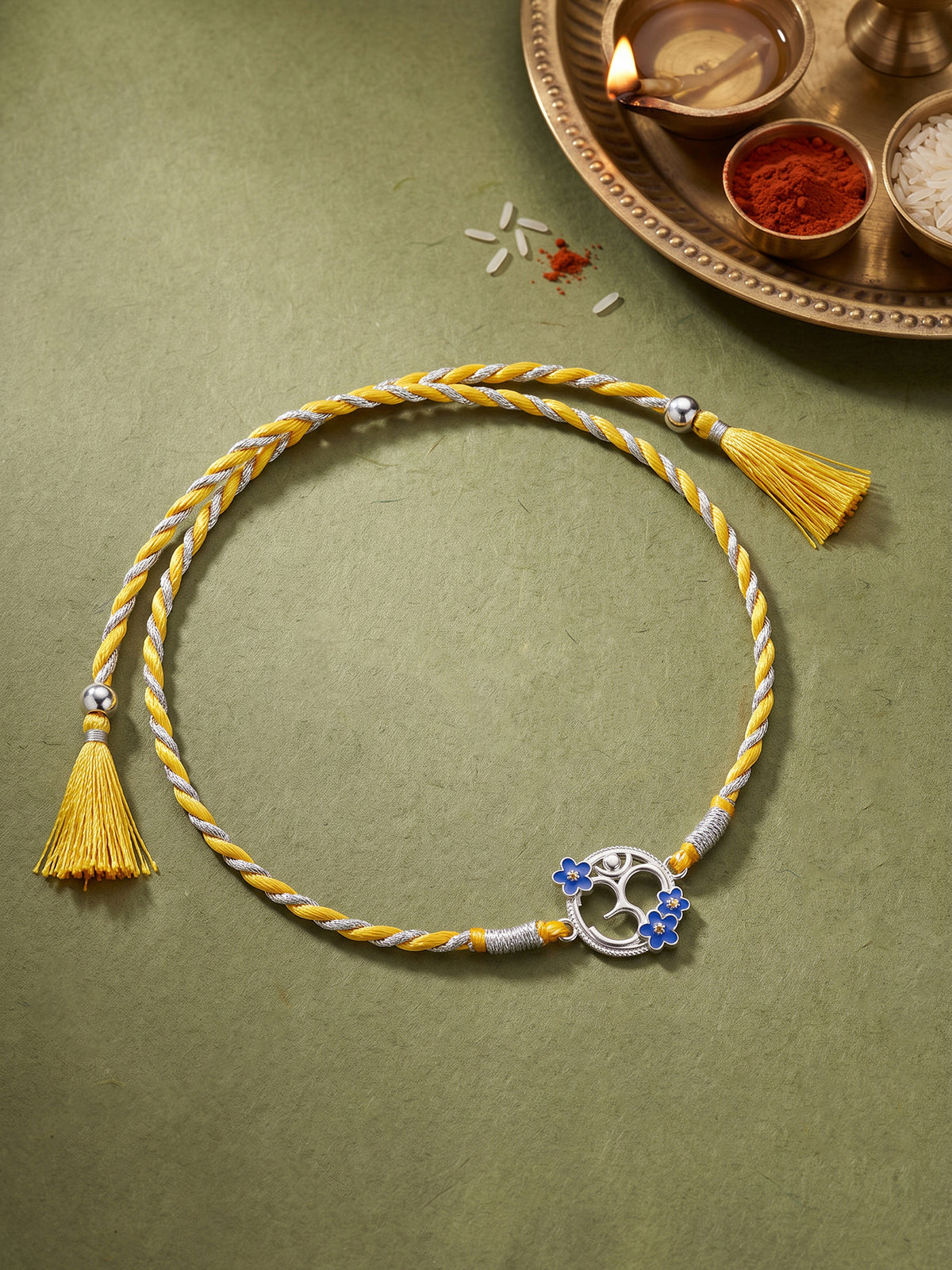 Silver Floral Omkara Rakhi