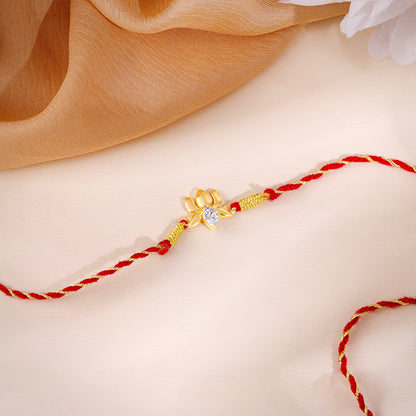 Golden Bloom Lotus Rakhi