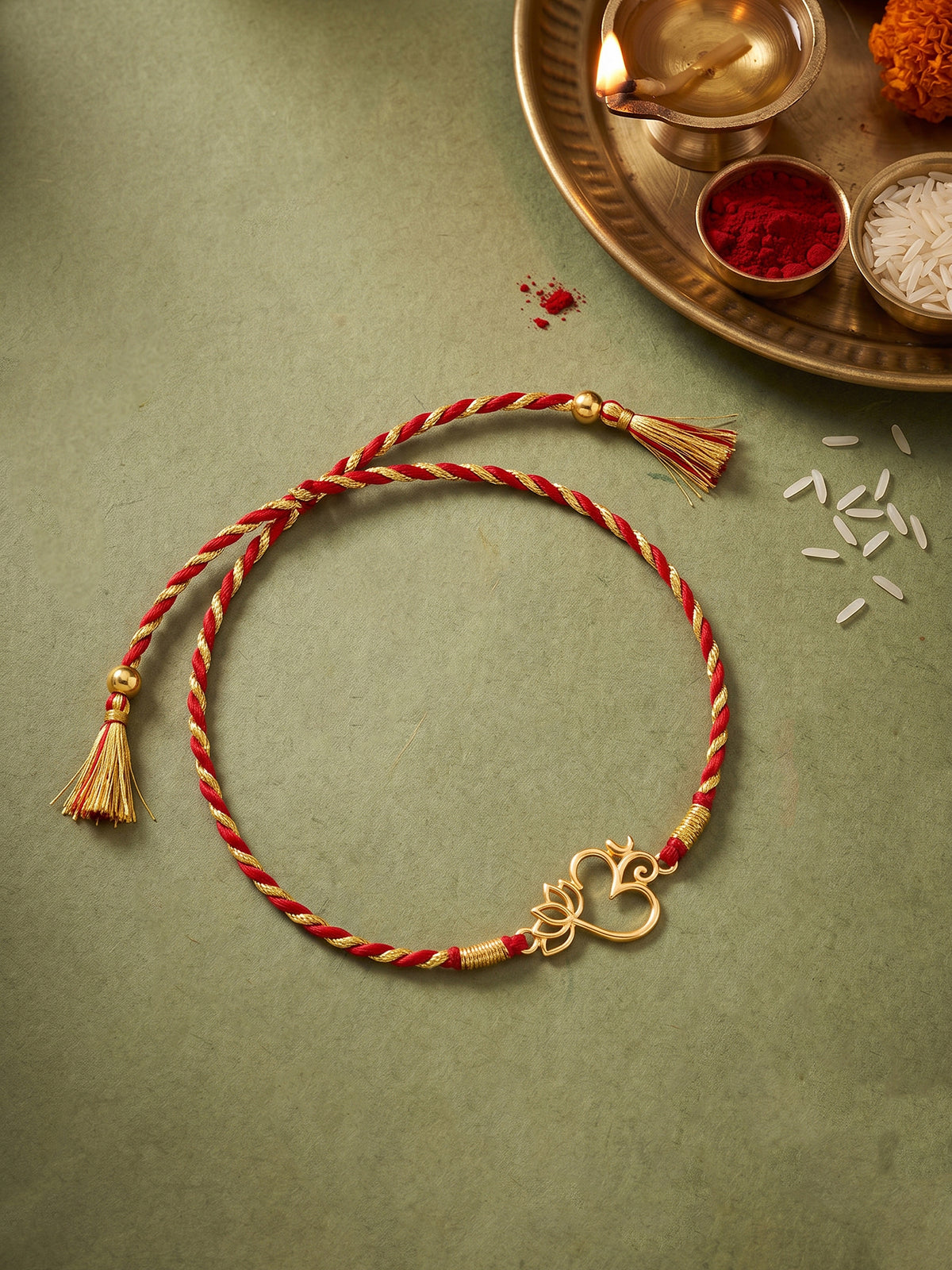 Golden Floral Omkara Rakhi