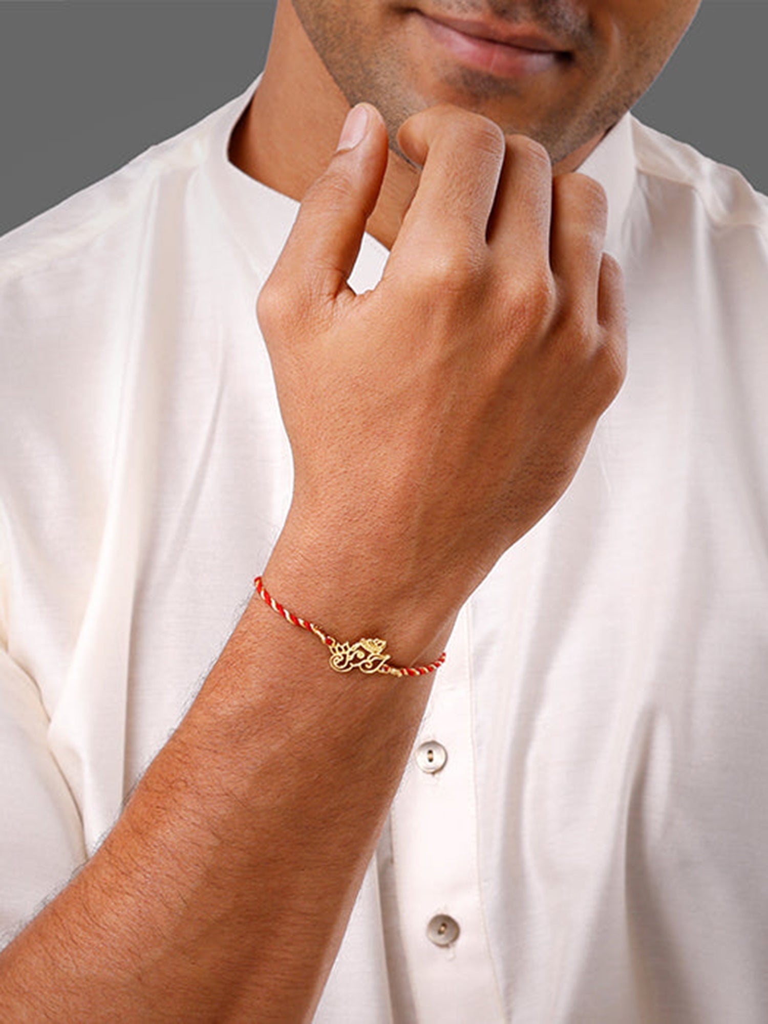 Golden Ganesha Lotus Rakhi