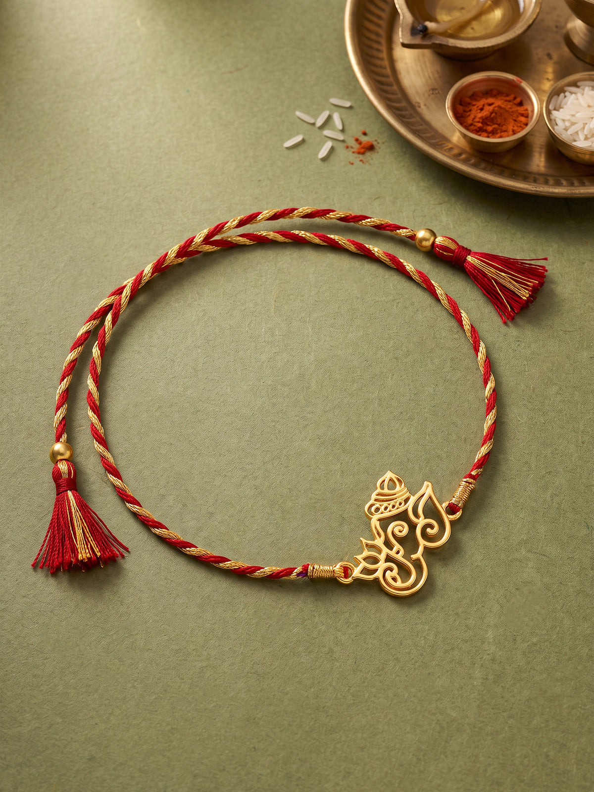 Golden Ganesha Lotus Rakhi