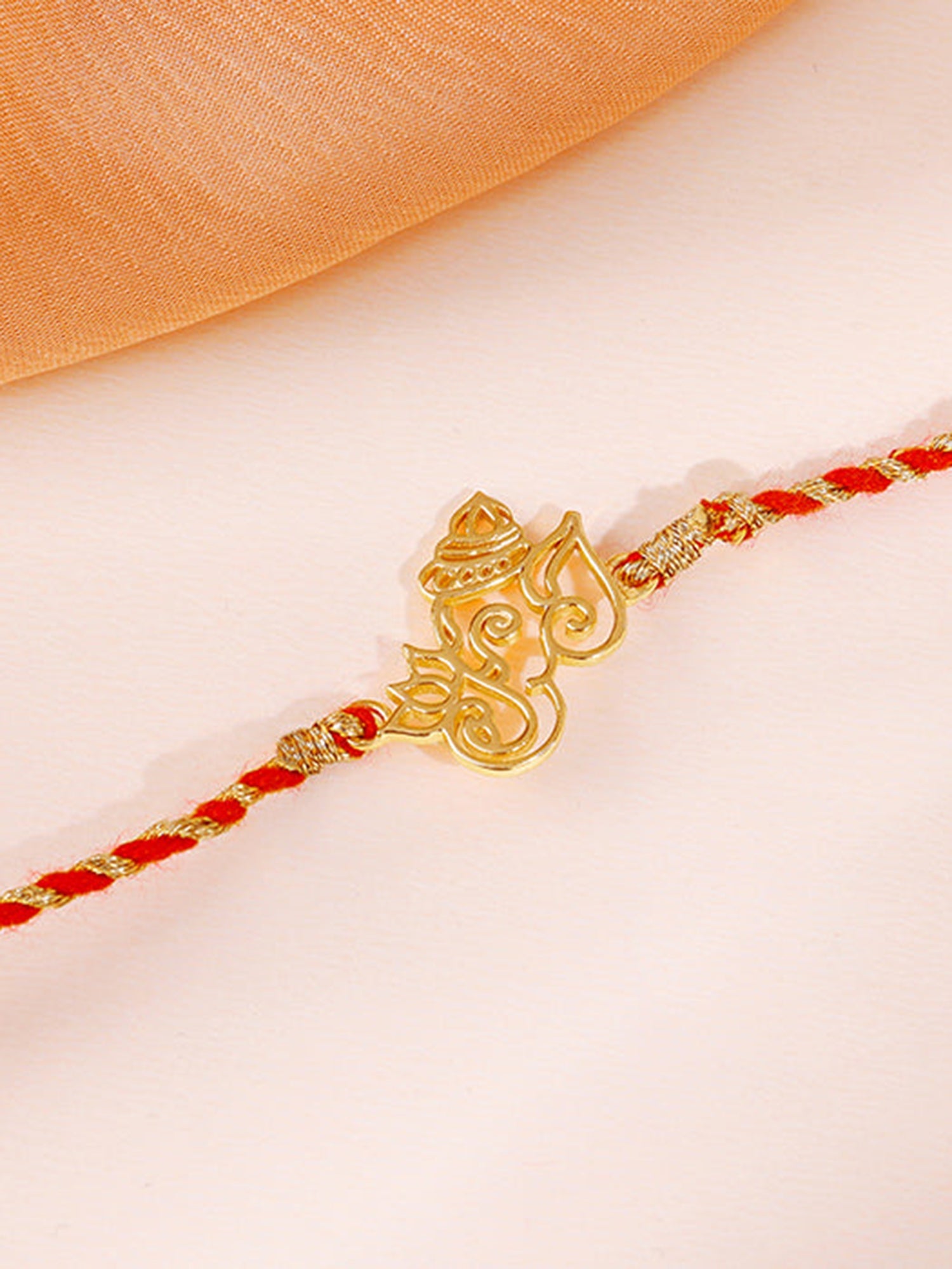 Golden Ganesha Lotus Rakhi