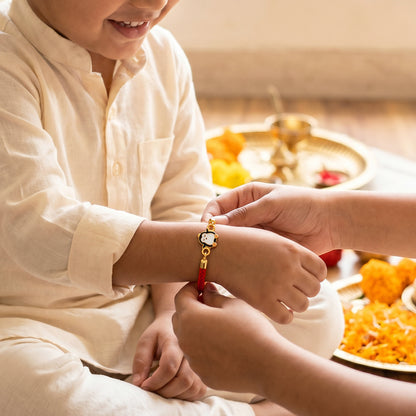 Golden Penguin Joy Rakhi