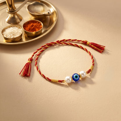 Gold Plated Pearl Evil Eye Rakhi