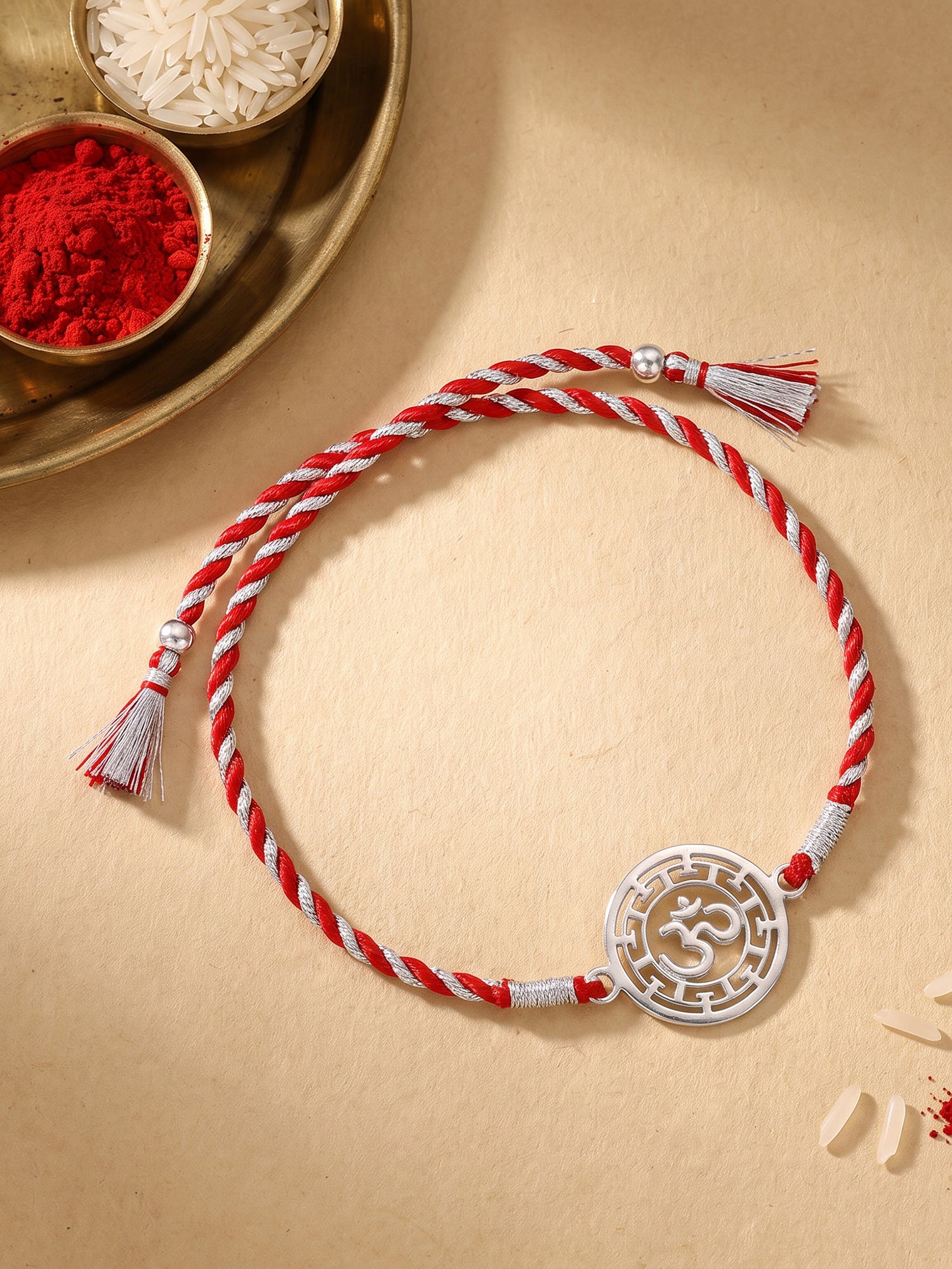 Silver Protected Om Rakhi