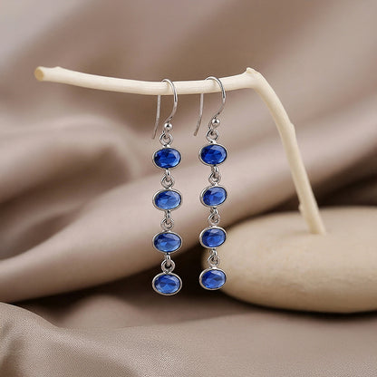 Silver Sky Glow Dangler Earrings