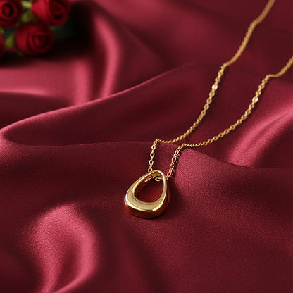 Golden Pebble Pendant With Link Chain