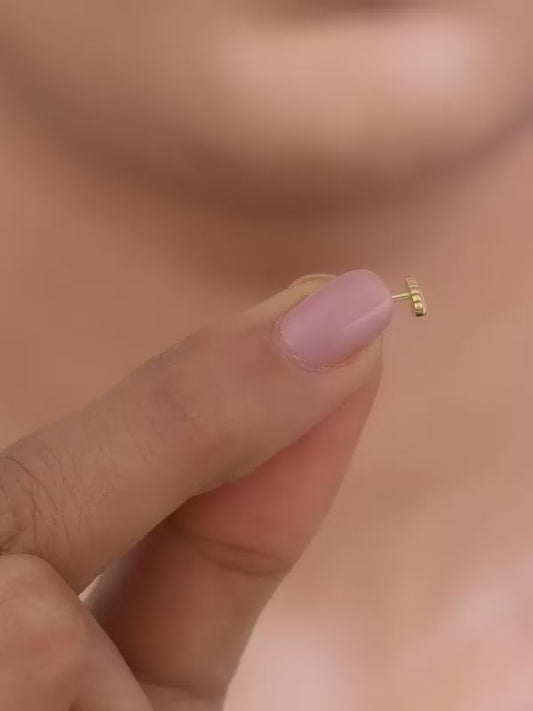 Golden Eyeconic Ear Piercings