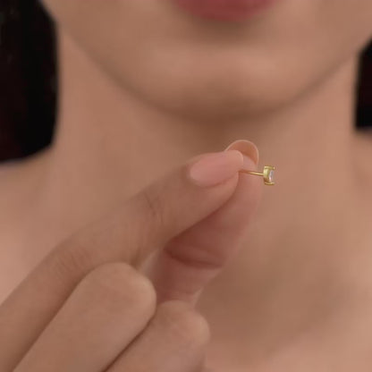 Golden Sia Ear Piercings