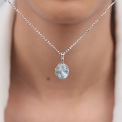 Silver Halo Blue Topaz Pendant With Link Chain