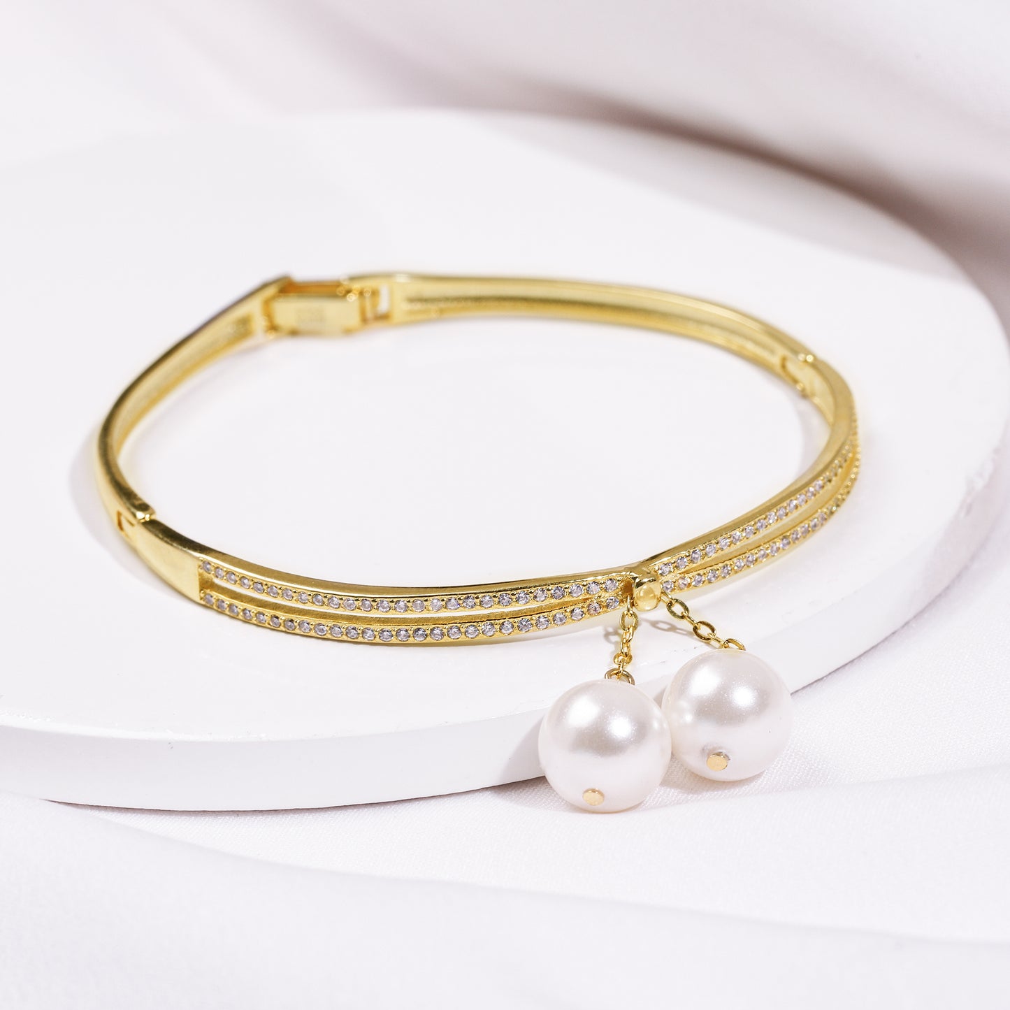 Golden Dangling Pearl Bangle Bracelet